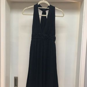 Black dress with a cross over strap back (L)